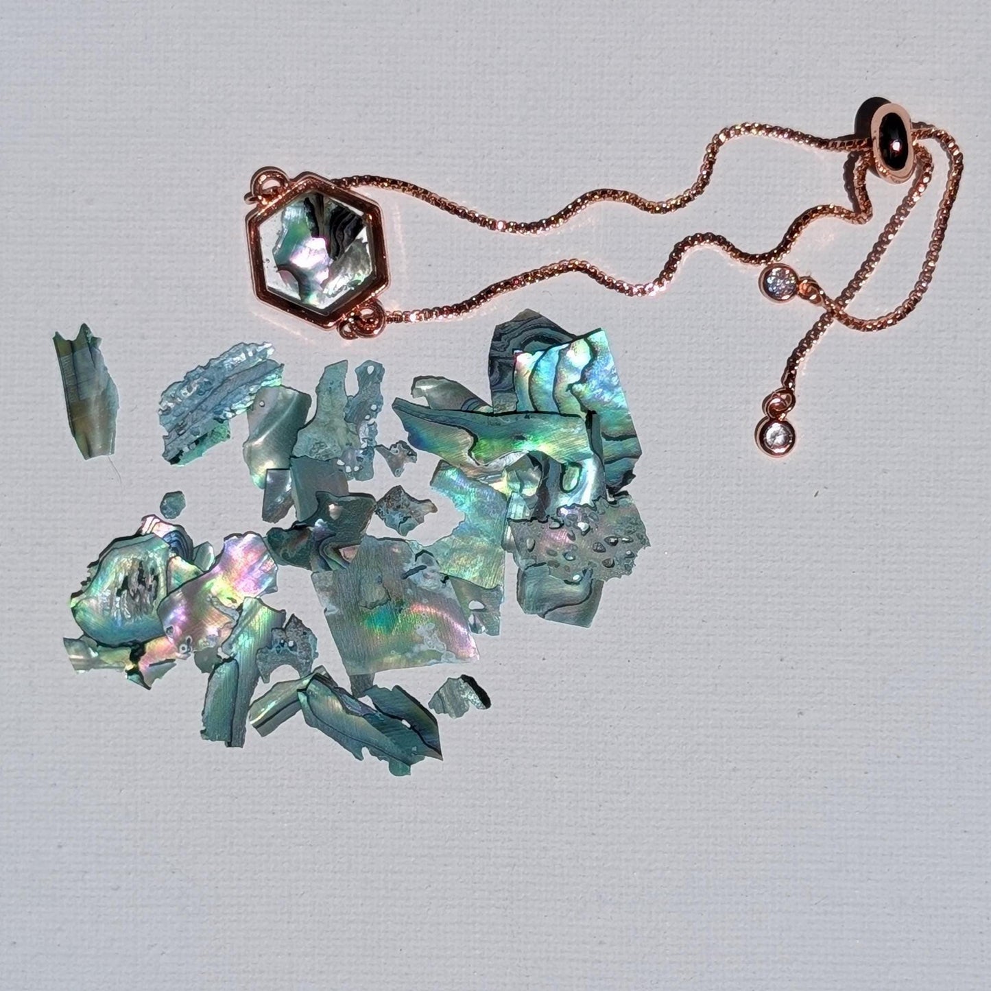 Lightweight travel jewelry with shimmer abalone charm and adjustable fit