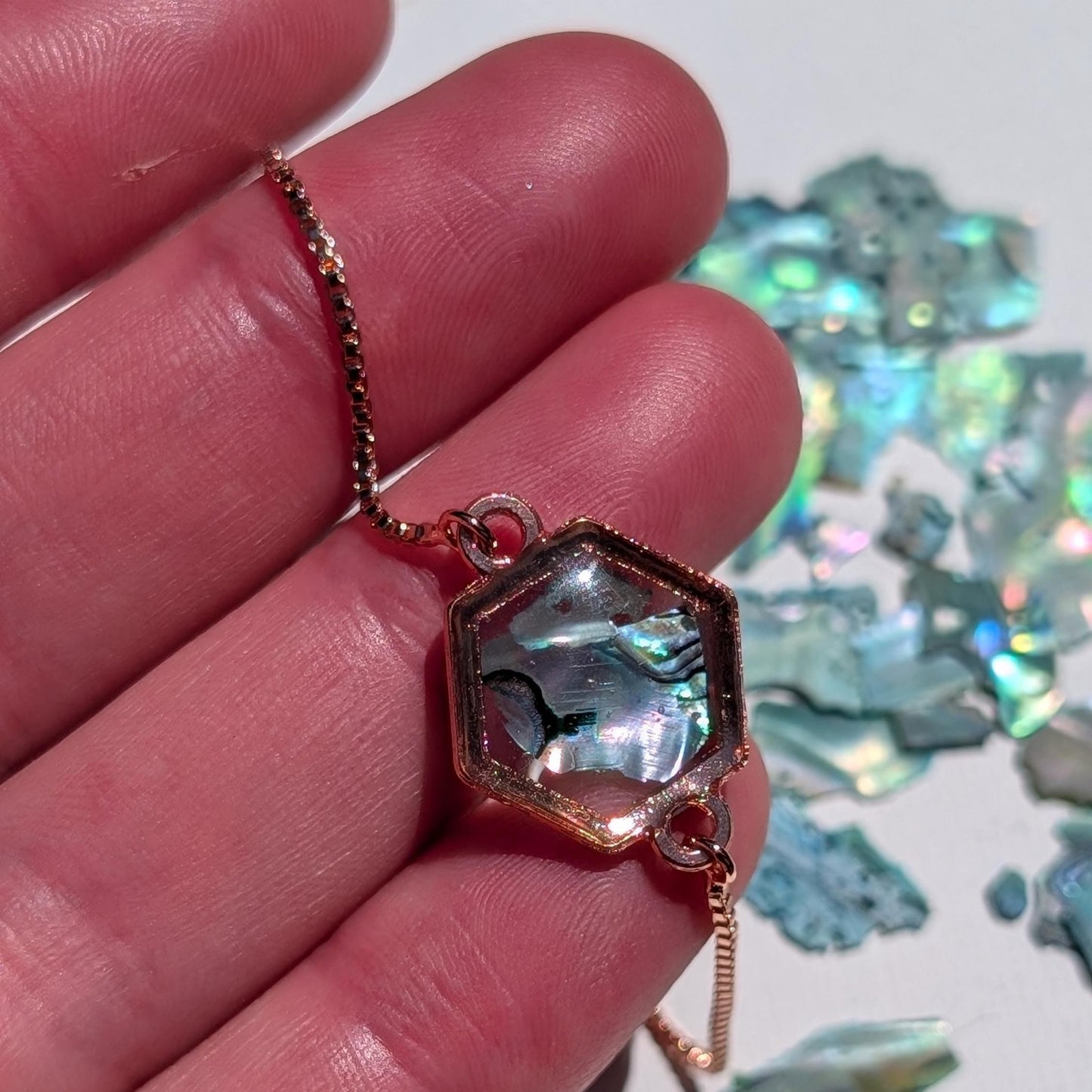 Mermaidcore fashion accessory with shimmer shell and boho charm