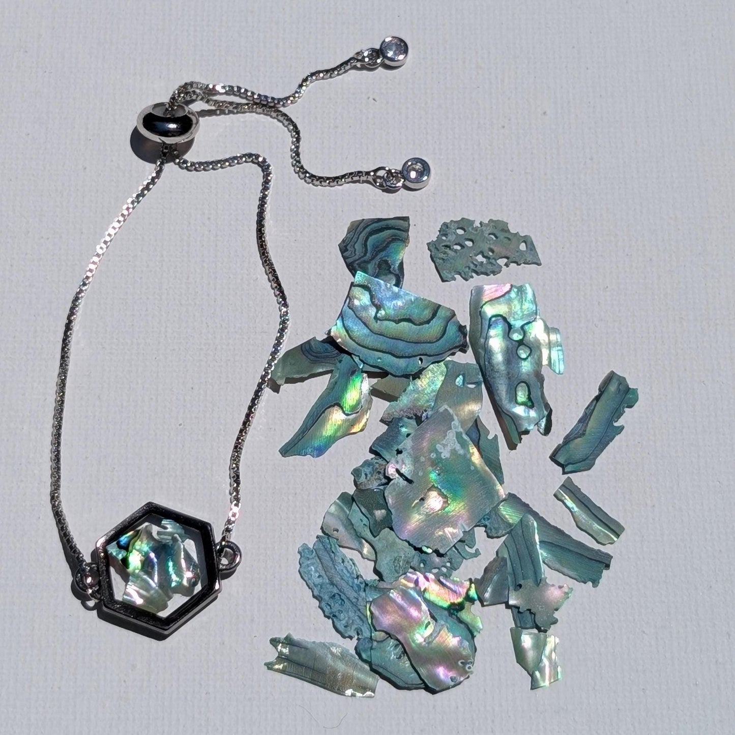 Jewelry for sea lovers featuring abalone hexagon charm and adjustable chain