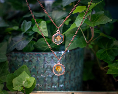 Birthday gift for her showing close-up of resin rose pendant on adjustable chain. Ideal for flower lovers and botanical jewelry fans.