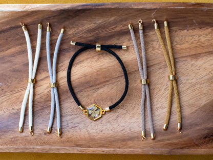 Nature-inspired boho bracelet with adjustable cord real preserved clover resin charm gold hexagon pendant festival accessory for any style