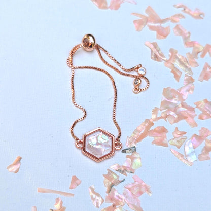 Teen girl gift idea featuring pastel pink charm bracelet